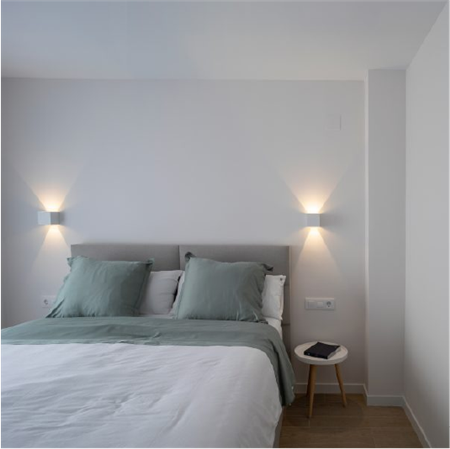 Kub aplique de pared bidireccional.Grok